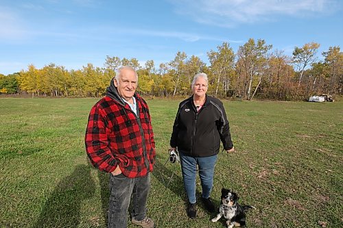 David and Yvonne Richardson are seen in front of the haunted forest during set up last week. (Connor McDowell/The Brandon Sun)