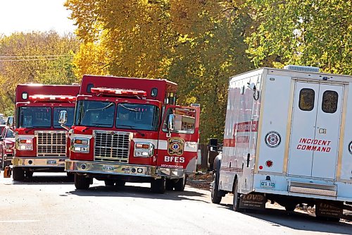 Brandon Fire and Emergency Services members respond to a fire at a home on Percy Street in Brandon’s east end on Tuesday. According to neighbours a lone male occupant of the home was taken to hospital in unknown condition.
(Tim Smith/The Brandon Sun)