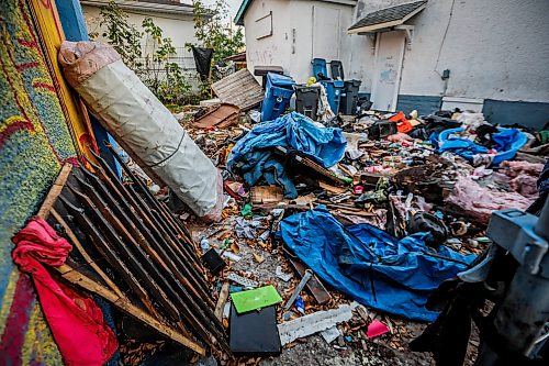 JOHN WOODS / FREE PRESS
Garbage behind a store on Aikens and Manitoba which was burned out and boarded up in the William Whyte neighbourhood in Winnipeg, Monday, October 5, 2026. It was renovated but never opened.

reporter: Julie