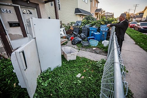 JOHN WOODS / FREE PRESS
Darren Warren, president of the William Whyte Neighbourhood Association, speaks about boarded up houses and other housing conditions as he looks at scape metal and garbage dumped on a Magnus lot in the William Whyte neighbourhood in Winnipeg, Monday, October 5, 2026. 

reporter: Julie