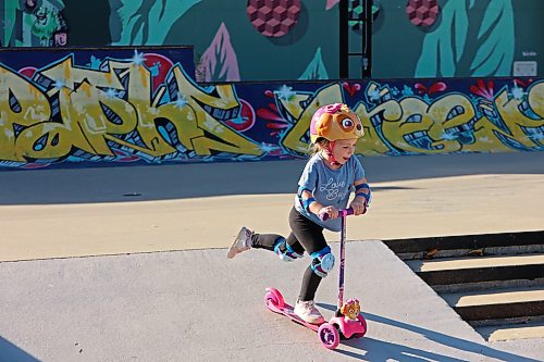 Ophelia Saville scooters in the sun at the Kristopher Campbell Memorial Skate Plaza in Brandon on a warm Wednesday afternoon. (Tim Smith/The Brandon Sun)