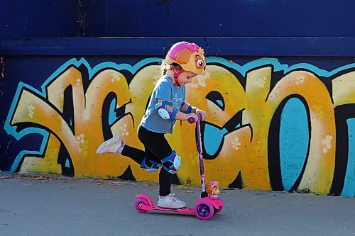 Ophelia Saville scooters in the sun at the Kristopher Campbell Memorial Skate Plaza in Brandon on a warm Wednesday afternoon. (Tim Smith/The Brandon Sun)