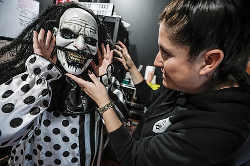 JOHN WOODS / FREE PRESS
Jen Zoratti, prepares backstage for her horror acting with Killer Noob Escapes owner Lisa McMillan Tuesday, October 6, 2026. Zoratti dressed as an evil clown and scared people taking part in an escape room.
reporter: jen