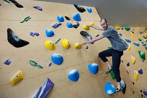 BROOK JONES/FREE PRESS
David Kalmakoff, 30, who recently opened a small bouldering facility called the Kal Climbing Gym at 222 St. Mary's Rd. in Winnipeg, Man., is pictured climbing on the afternoon of Oct. 9, 2026.
