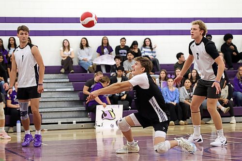 Ashton Penner passes the ball during Friday afternoon's action. (Tim Smith/The Brandon Sun)
