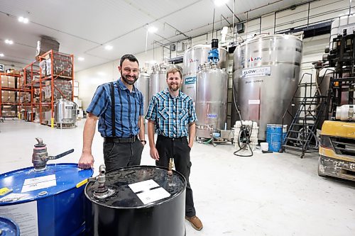 Ruth Bonneville / Free Press

Biz- Morris Ecopoxy 

Business photo of EcoPoxy GM, Aaron Maendel (left) and assistant GM, Darren Maendel, in front of their large blending tanks that mix and store their products at their production facility on the Oak Bluff Hutterite Colony.

Business feature story on Ecopoxy:  Tour of Ecopoxy, a  epoxy resin business owned by the Oak Bluff Hutterite Colony near Morris Manitoba.  For a 49.8 feature on the boom in Hutterite manufacturing over the past decade.

EcoPoxy is a Canadian farm-based company that produces bio-based epoxies for many commercial and creative arts uses. 

Story by Gabby

Oct 9th, 2026