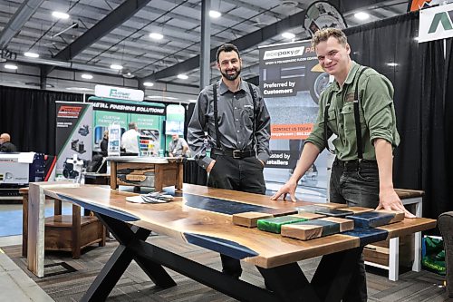 Ruth Bonneville / Free Press

Biz- Hutterite Manufacturing &amp; Associate Expo

EcoPoxy GM, Aaron Maendel with Jacob Maendel - custom creations woodworker, at their booth at the Expo Friday. 

EcoPoxy is a Canadian farm-based company that produces bio-based epoxies to inspire and empower woodworkers and artists to create beautiful projects.

Story: Hutterite Manufacturing &amp; Associate Expo  at Red River Exhibition Park for a feature on the growth of Hutterite manufacturers in Manitoba.

Photographed on Aug 14th,  2026

Story by Gabby 

Oct 9th, 2026