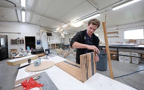 Ruth Bonneville / Free Press
Biz- Morris Ecopoxy
Ecopoxy custom woodworker, Jacob Maendel, sands one of many side tables he’s made with reclaimed wood and inlaid with a specialized epoxy, in the wood-shop at Oak Bluff Hutterite Colony.
Business feature story on Ecopoxy: Tour of Ecopoxy, a epoxy resin business owned by the Oak Bluff Hutterite Colony near Morris Manitoba. For a 49.8 feature on the boom in Hutterite manufacturing over the past decade.
EcoPoxy is a Canadian farm-based company that produces bio-based epoxies for many uses.
Story by Gabby
Oct 9th, 2026