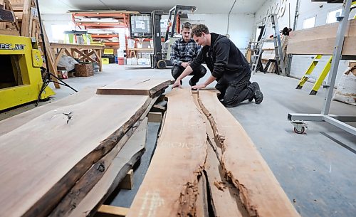 Ruth Bonneville / Free Press
Biz- Morris Ecopoxy
Ecopoxy custom woodworker, Dean Maendel (left) and Jacob Maendel, looking at reclaimed wood in the wood-shop at Oak Bluff Hutterite Colony.
Business feature story on Ecopoxy: Tour of Ecopoxy, a epoxy resin business owned by the Oak Bluff Hutterite Colony near Morris Manitoba. For a 49.8 feature on the boom in Hutterite manufacturing over the past decade.
EcoPoxy is a Canadian farm-based company that produces bio-based epoxies for many uses.
Story by Gabby
Oct 9th, 2026