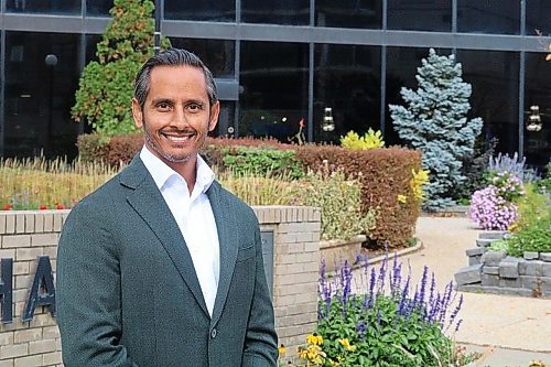 Enver Naidoo pictured outside city hall on Thursday. The former CEO of Westman Immigrant Services is running for council for the first time in Ward 3. (Rylee Gerrard/The Brandon Sun)