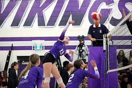 Hollie Brugger #13 of the Vincent Massey Vikings leaps to hammer the ball during the Vikings match against the Collège Stonewall Collegiate Rams in the Viking Classic High School Varsity Girls Volleyball Tournament at VMHS on Friday.
(Tim Smith/The Brandon Sun)