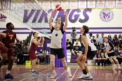 Samuel Redekop #8 of the Vincent Massey Vikings sets the ball as the Vikings play the Dr. Martin LeBoldus High School Golden Suns during the Viking Classic High School Varsity Volleyball Tournament at VMHS on Friday. 
(Tim Smith/The Brandon Sun)
