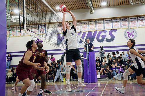 Samuel Redekop #8 of the Vincent Massey Vikings sets the ball as the Vikings play the Dr. Martin LeBoldus High School Golden Suns during the Viking Classic High School Varsity Volleyball Tournament at VMHS on Friday.
(Tim Smith/The Brandon Sun)
