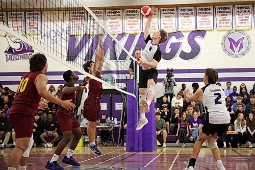Samuel Redekop #8 of the Vincent Massey Vikings hammers the ball over the net as the Vikings play the Dr. Martin LeBoldus High School Golden Suns during the Viking Classic High School Varsity Volleyball Tournament at VMHS on Friday.
(Tim Smith/The Brandon Sun)