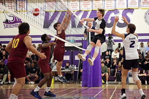 Samuel Redekop #8 of the Vincent Massey Vikings hammers the ball over the net as the Vikings play the Dr. Martin LeBoldus High School Golden Suns during the Viking Classic High School Varsity Volleyball Tournament at VMHS on Friday.
(Tim Smith/The Brandon Sun)
