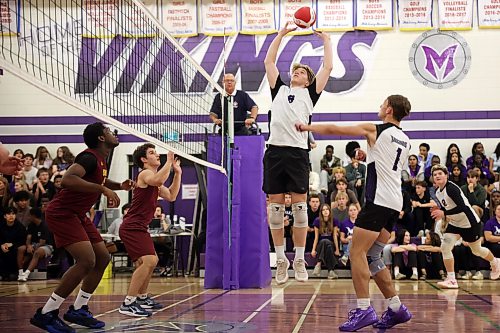 Samuel Redekop #8 of the Vincent Massey Vikings sets the ball as the Vikings play the Dr. Martin LeBoldus High School Golden Suns during the Viking Classic High School Varsity Volleyball Tournament at VMHS on Friday.
(Tim Smith/The Brandon Sun)
