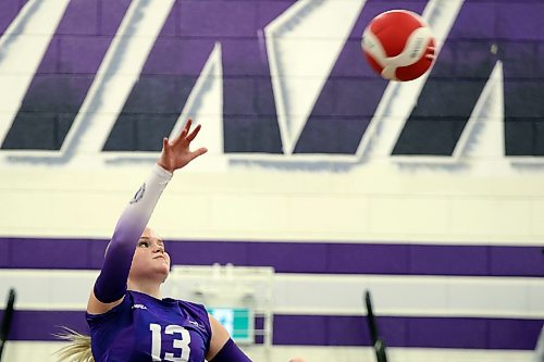 Hollie Brugger #13 of the Vincent Massey Vikings puts the ball over the net during the Vikings match against the Collège Stonewall Collegiate Rams in the Viking Classic High School Varsity Girls Volleyball Tournament at VMHS on Friday.
(Tim Smith/The Brandon Sun)