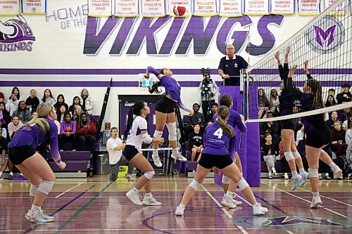 Elli Creaser #11 of the Vincent Massey Vikings leaps to put the ball over the net during the Vikings match against the Collège Stonewall Collegiate Rams in the Viking Classic High School Varsity Girls Volleyball Tournament at VMHS on Friday. 
(Tim Smith/The Brandon Sun)
