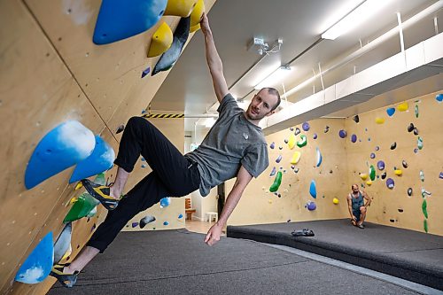 BROOK JONES/FREE PRESS
David Kalmakoff, 30, who recently opened a small bouldering facility called the Kal Climbing Gym at 222 St. Mary's Rd. in Winnipeg, Man., is pictured climbing on the afternoon of Oct. 9, 2026.
