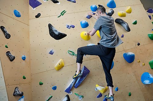 BROOK JONES/FREE PRESS
David Kalmakoff, 30, who recently opened a small bouldering facility called the Kal Climbing Gym at 222 St. Mary's Rd. in Winnipeg, Man., is pictured climbing on the afternoon of Oct. 9, 2026.