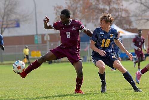 Assiniboine College's Adeniyi Adetunmobi and Brandon University's Levi Francis battle for the ball during their MCAC men's soccer game at the Healthy Living Centre field on Saturday. Brandon won 9-0. (Thomas Friesen/The Brandon Sun)
