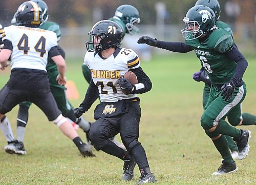 Interlake running back Christian Mozdzen rushes the football. Mozden gashes the Spartans defence, picking up big yardage and scoring three touchdowns in the game. (Rowan McCarthy/The Brandon Sun)