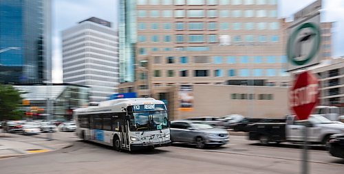 ROBERT LEE / FREE PRESS
Winnipeg Transit busses drive down Main Street in Winnipeg on Thursday, August 20, 2026.