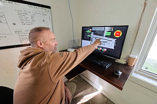 Dean Toews said that the grain dryer will be running 24/7 for weeks this fall to dry corn that is being harvested. He is monitoring the dryer in his office, and notes that humidity in corn was high this year. (Connor McDowell/The Brandon Sun)