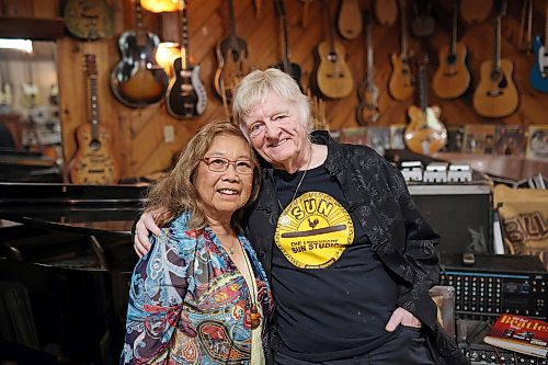 Manitoba music royalty Sue-On and Bill Hillman, surrounded by musical instruments, the many albums they released and other paraphernalia in the basement of their home in Brandon on Wednesday, October 14, 2026. 
(Tim Smith/The Brandon Sun)