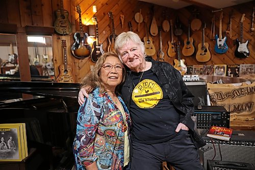 Manitoba music royalty Sue-On and Bill Hillman, surrounded by musical instruments, the many albums they released and other paraphernalia in the basement of their home in Brandon on Wednesday, October 14, 2026. 
(Tim Smith/The Brandon Sun)