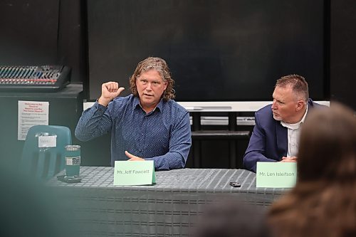 Mayor Jeff Fawcett (left) responds to a question while fellow candidate Len Isleifson looks on during the mayoral candidate forum organized by École secondaire Neelin High School students on Friday morning. (Abiola Odutola/The Brandon Sun)