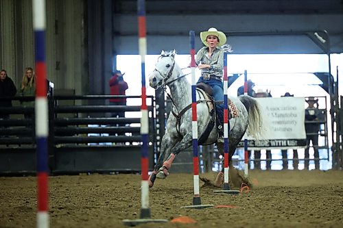 Keightley Stewart of Virden competes in the high school pole bending event. (Tim Smith/The Brandon Sun)