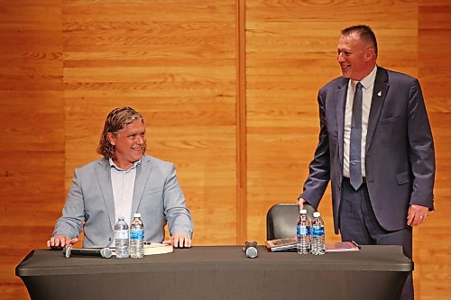 City of Brandon Mayoral candidates Jeff Fawcett and Len Isleifson take their seats for the mayoral debate at Brandon University’s Lorne Watson Recital Hall on Friday evening.
(Tim Smith/The Brandon Sun)