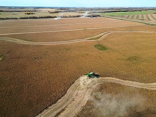 Combines harvest soybeans during the Acres of Hope Rivers and Oak River community harvest in support of the Canadian Foodgrains Bank at a field east of Rivers on Monday. Farmers from the area came together to harvest approximately 155 acres of soybeans, which will be sold at market with the proceeds going to the CFB. CFB has close to three dozen growing projects in Manitoba this year. The Acres of Hope harvest is the last of CFB project harvests for 2026. The CFB works to help provide resources in food insecure areas around the world with the aim of ending ending hunger. Dozens of volunteers are involved in the Acres of Hope project, donating time, seed, chemicals, equipment and anything else needed for the project. Six combines took part in the harvest on Monday, as well as grain carts and grain trucks. Combines harvest soybeans during the Acres of Hope Rivers and Oak River community harvest in support of the Canadian Foodgrains Bank at a field east of Rivers on Monday. Farmers from the area came together to harvest approximately 155 acres of soybeans, which will be sold at market with the proceeds going to the CFB. CFB has close to three dozen growing projects in Manitoba this year. The Acres of Hope harvest is the last of CFB project harvests for 2026. The CFB works to help provide resources in food insecure areas around the world with the aim of ending ending hunger. Dozens of volunteers are involved in the Acres of Hope project, donating time, seed, chemicals, equipment and anything else needed for the project. Six combines took part in the harvest on Monday, as well as grain carts and grain trucks.
(Tim Smith/The Brandon Sun)
