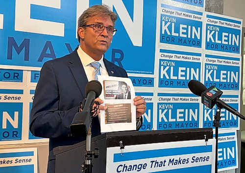 MATTHEW FRANK / FREE PRESS

Mayoral candidate Kevin Klein holds attack ads by the Canadian Union of Public Employees Local 500 during a press conference Tuesday.
