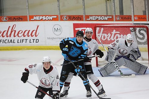 Xander Mecas screens Virden goaltender Kasey Fuson. Mecas has two assists in seven games so far this season. (Rowan McCarthy/The Brandon Sun).