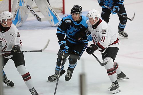 Xander Mecas battles with Virden Oil Capitals forward Cole Dupuis off a faceoff in the Winnipeg zone. At six-foot-three, Mecas plays great positional hockey and can be very physical when he chooses. (Rowan McCarthy/The Brandon Sun).