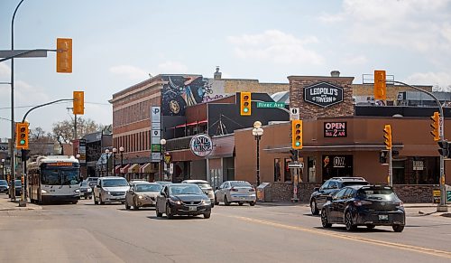 Mike Deal / Winnipeg Free Press
People cross the intersections at River and Osborne Wednesday afternoon. The Osborne Village BIZ has proposed a new plan suggesting the city add a pedestrian scramble – which stops all traffic for a period to let all pedestrians cross in all directions at the same time, at the intersection.
See Joyanne story
230510 - Wednesday, May 10, 2023.