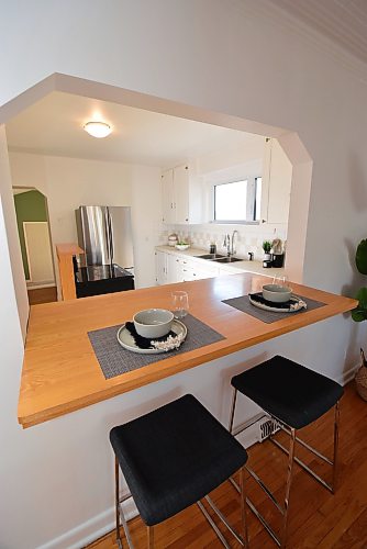 Todd Lewys / Free Press
A lovely eating nook opens onto the spacious kitchen via a stylish cutout on the living room’s rear wall that deftly connects the two spaces.
