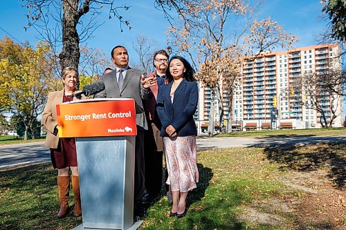 MIKE DEAL / FREE PRESS
Premier Wab Kinew announces that his government is changing regulations to cut above-guideline rent increases by 40 per cent and strengthen protections for renters, during a press conference across from the Courts of St. James, a major high-rise apartment complex on Portage Avenue, Tuesday afternoon.
The Premier was joined by Aidan Wilson (second from right), a renters advocate, Lisa Naylor (left), Minister of Transportation and Infrastructure, along with MLA’s Logan Oxenham (Kirkfield Park) (second from left), and Jennifer Chen (Fort Richmond) (right).
Reporter: Scott Billeck and Joyanne Pursaga
261020 - Tuesday, October 20, 2026.