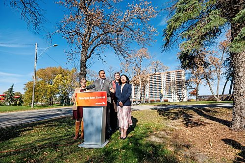 MIKE DEAL / FREE PRESS
Premier Wab Kinew announces that his government is changing regulations to cut above-guideline rent increases by 40 per cent and strengthen protections for renters, during a press conference across from the Courts of St. James, a major high-rise apartment complex on Portage Avenue, Tuesday afternoon.
The Premier was joined by Aidan Wilson (second from right), a renters advocate, Lisa Naylor (left), Minister of Transportation and Infrastructure, along with MLA’s Logan Oxenham (Kirkfield Park) (second from left), and Jennifer Chen (Fort Richmond) (right).
Reporter: Scott Billeck and Joyanne Pursaga
261020 - Tuesday, October 20, 2026.