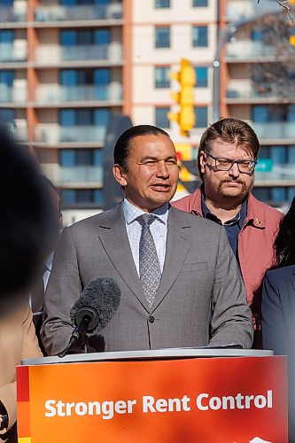 MIKE DEAL / FREE PRESS
Premier Wab Kinew announces that his government is changing regulations to cut above-guideline rent increases by 40 per cent and strengthen protections for renters, during a press conference across from the Courts of St. James, a major high-rise apartment complex on Portage Avenue, Tuesday afternoon.
The Premier was joined by Aidan Wilson (right), a renters advocate, and others who were not in this photo; Lisa Naylor, Minister of Transportation and Infrastructure, along with MLA’s Logan Oxenham (Kirkfield Park), and Jennifer Chen (Fort Richmond).
Reporter: Scott Billeck and Joyanne Pursaga
261020 - Tuesday, October 20, 2026.