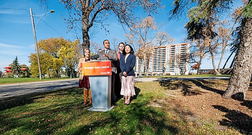 MIKE DEAL / FREE PRESS
Premier Wab Kinew announces that his government is changing regulations to cut above-guideline rent increases by 40 per cent and strengthen protections for renters, during a press conference across from the Courts of St. James, a major high-rise apartment complex on Portage Avenue, Tuesday afternoon.
The Premier was joined by Aidan Wilson (second from right), a renters advocate, Lisa Naylor (left), Minister of Transportation and Infrastructure, along with MLA’s Logan Oxenham (Kirkfield Park) (second from left), and Jennifer Chen (Fort Richmond) (right).
Reporter: Scott Billeck and Joyanne Pursaga
261020 - Tuesday, October 20, 2026.