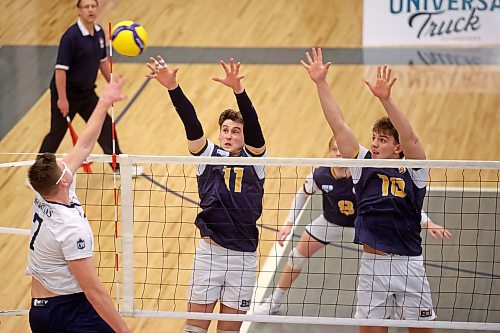 Liam Kindle (11), Matt Siebenga and the Brandon University men's volleyball team open the Canada West season on the road on Friday against the UBC Okanagan Heat. (Tim Smith/The Brandon Sun)