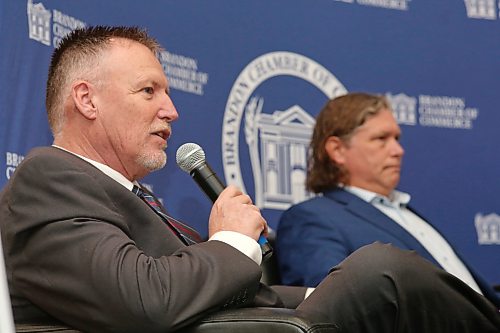 Sitting beside incumbent Mayor Jeff Fawcett, mayoral candidate Len Isleifson speaks to the audience during a Breakfast with the Mayoral Candidates event hosted by the Brandon Chamber of Commerce at the Victoria Inn on Wednesday morning. (Matt Goerzen/The Brandon Sun)