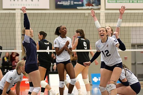 The Brandon University Bobcats celebrate an upset victory over the UBC Okanagan Heat last season. They open the Canada West women's volleyball season against the Heat today in Kelowna, B.C. (Thomas Friesen/The Brandon Sun)