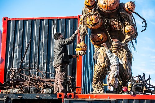 MIKAELA MACKENZIE / FREE PRESS
	
Ivan Partsei works on re-attaching an arm to a giant figure at Heebie Jeebies on Thursday, Oct. 22, 2026.

For Aaron story.
Free Press 2026