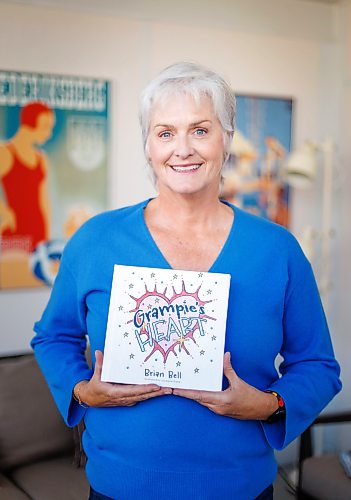MIKE DEAL / FREE PRESS
Beth Bell with her a children’s book written by her late husband, Brian Bell. A former Manitoba Crown attorney, Brian wrote the book while he was dying from cancer.
Reporter: Jen Zoratti
261022 - Thursday, October 22, 2026.