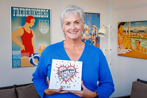 MIKE DEAL / FREE PRESS
Beth Bell with her a children’s book written by her late husband, Brian Bell. A former Manitoba Crown attorney, Brian wrote the book while he was dying from cancer.
Reporter: Jen Zoratti
261022 - Thursday, October 22, 2026.