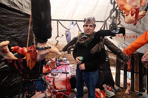 Mike Mitchell, a co-host of the Cedar Hollow haunted house, is seen in the butcher’s chamber of the Halloween-themed house. The haunted house has grown again, for the fourth consecutive year. (Connor McDowell/The Brandon Sun)